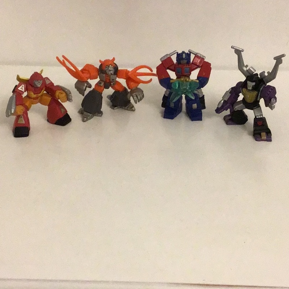 LOT OF 4 TRANSFORMERS MINI-FIGURES OPTIMUS PRIME